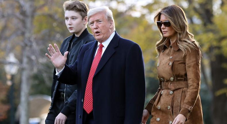 President Donald Trump, first lady Melania Trump and their son Barron Trump walk across the South Lawn before leaving the White House in 2019. Barron's high school graduation is next month.Chip Somodevilla/Getty Images
