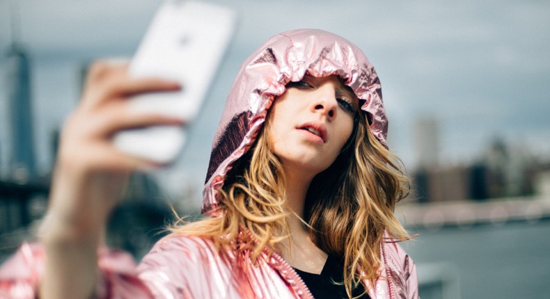 A stock photo of a young woman exploring New York City.ferrantraite/Getty Images