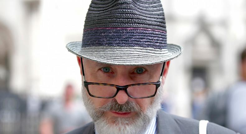 Labour party donor, Michael Foster, walks away from the High Court during a break in the challenge brought to oppose the automatic inclusion of Jeremy Corbyn's name in the ballot for the leadership election, London, Britain July 26, 2016.