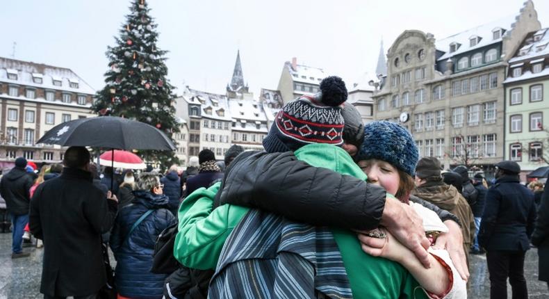 Hundreds of people gathered at the Christmas market in Strasbourg, eastern France, on Sunday to honour the victims of a gunman's shooting spree last week