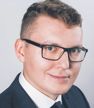 Damian Uszko biegły rewident, partner w HLB M2