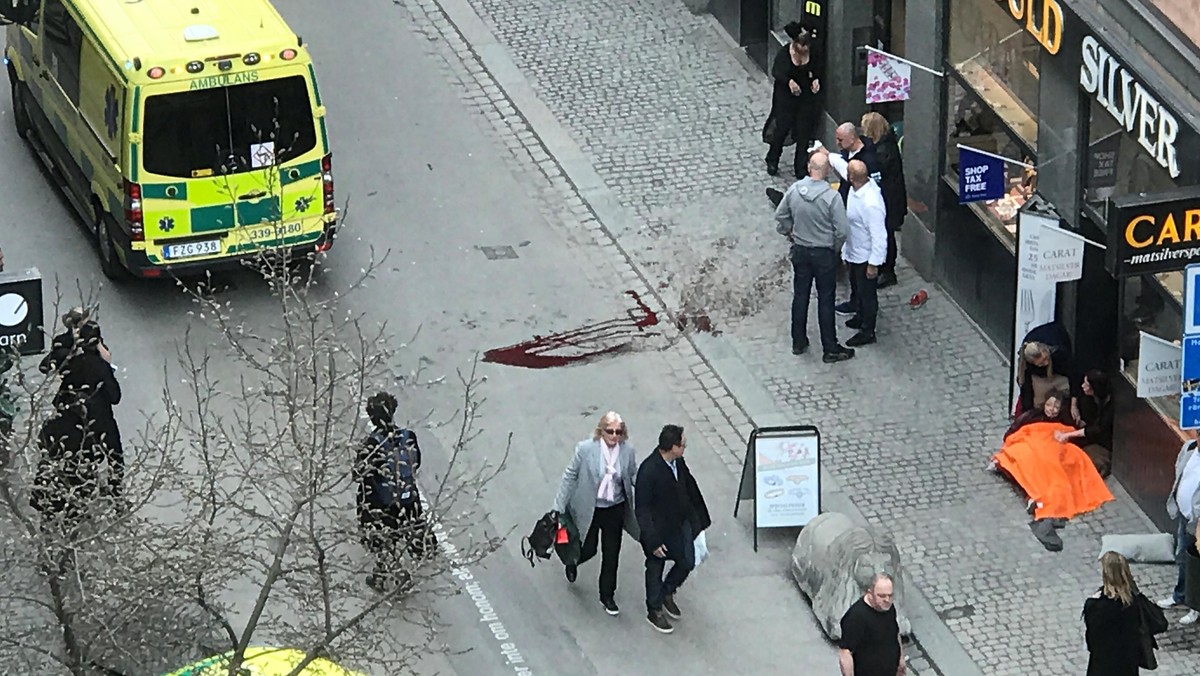 Ambulance in a street near the site were a truck was driving into a crowd in central Stockholm