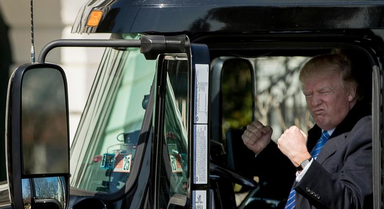 President Donald Trump sits in an 18-wheeler truck on March 23. He was meeting with truckers and CEOs at the White House to talk about healthcare.