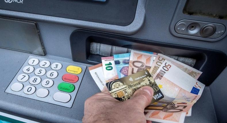 A Turkish computer hacker who helped steal $55 million from ATM machines in dozens of countries using data from credit card issuers was sentenced to eight years in prison