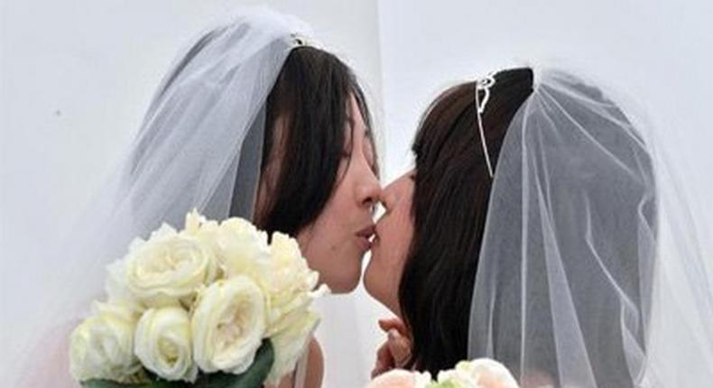 Lesbian Japanese couple at their wedding