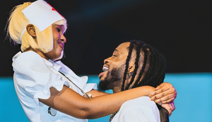 Diamond Platnumz with Zuchu on stage at a past event 