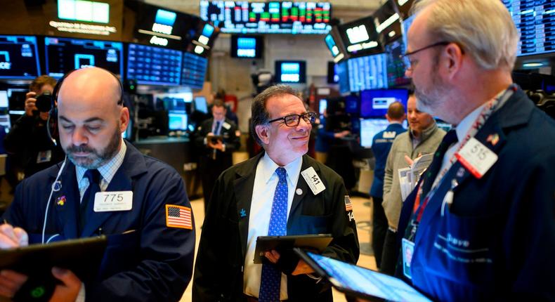 Traders work during the opening bell at the New York Stock Exchange (NYSE) on March 13, 2020 at Wall Street in New York City.Johannes Eisele/AFP/Getty Images