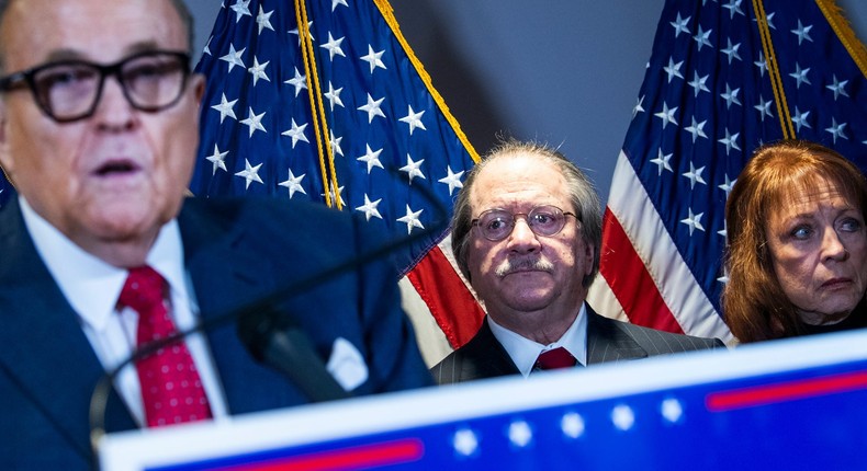 Rudolph Giuliani, Joseph diGenova, and Victoria Toensing, attorneys for then-President Donald Trump, conduct a news conference.
