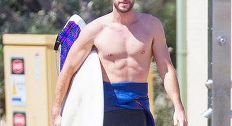 Liam Hemsworth goes shirtless in Malibu