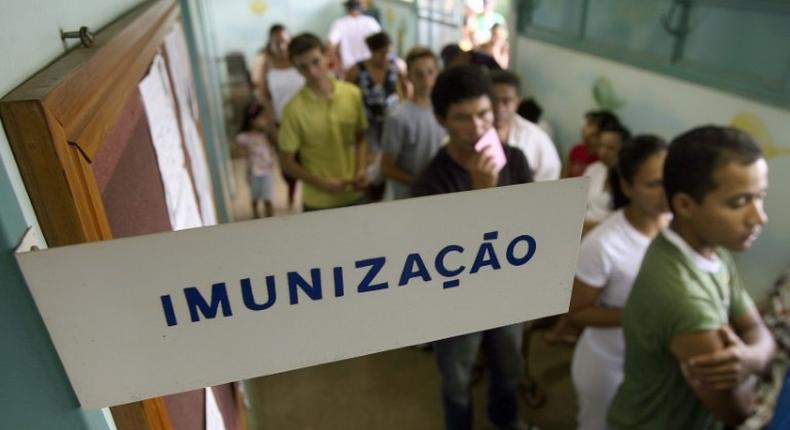 Residents of Brasilia line up to be immunized against yellow fever in January 2008