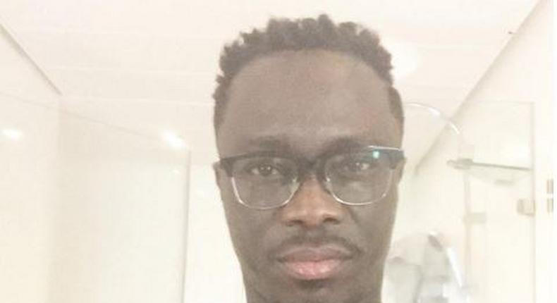 Shirtless selfie of Julius Agwu. 