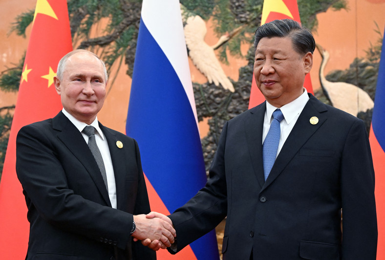 Prezydent Rosji Władimir Putin i przewodniczący Chińskiej Republiki Ludowej Xi Jinping