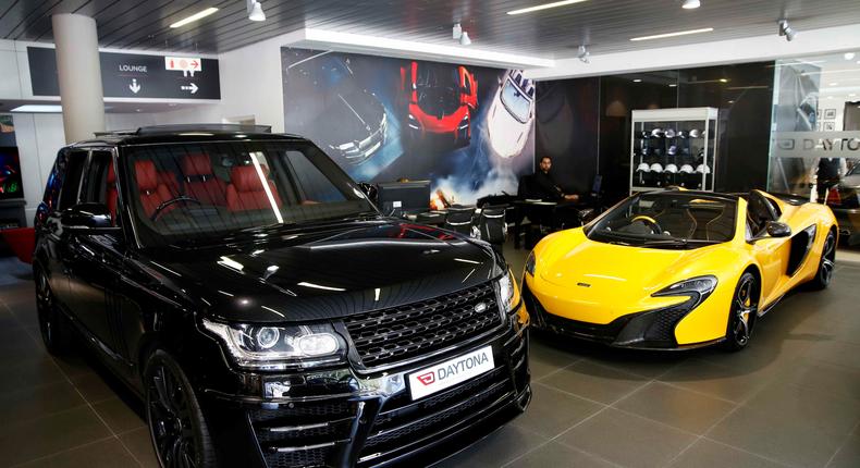 British-made luxury sports cars Range Rover and McLaren.