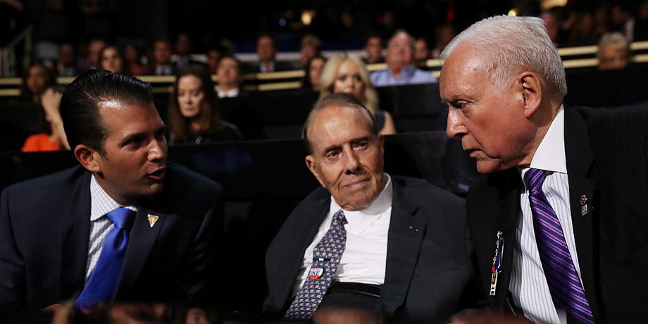 World War II veteran and former Sen. Bob Dole (R-KS) along with Donald Trump Jr. (L) and Senate Finance Committee Chairman Orrin Hatch (R-UT) (R) talk during the first day of the Republican National Convention on July 18, 2016 at the Quicken Loans Arena in Cleveland, Ohio.
