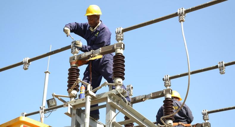 A Kenya Power worker on site