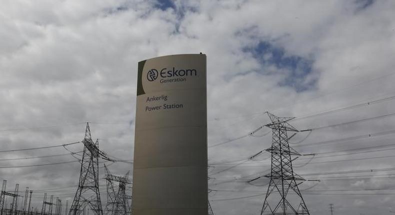 Pylons carry electricity from a sub-station of state power utility Eskom outside Cape Town in this picture taken March 20, 2016. 