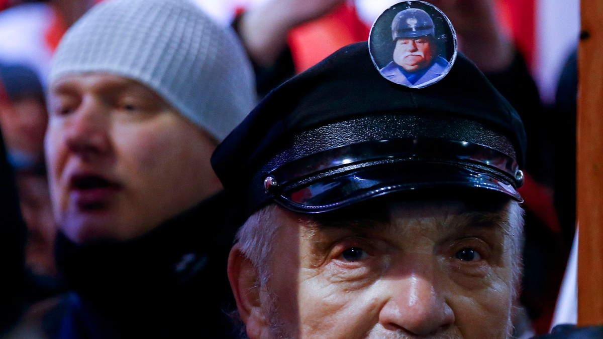 Pro-government activists attend a demonstration to mark the 35th anniversary of the marshal law in Warsaw