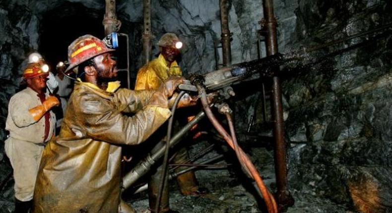 Miners sourcing for precious stones.