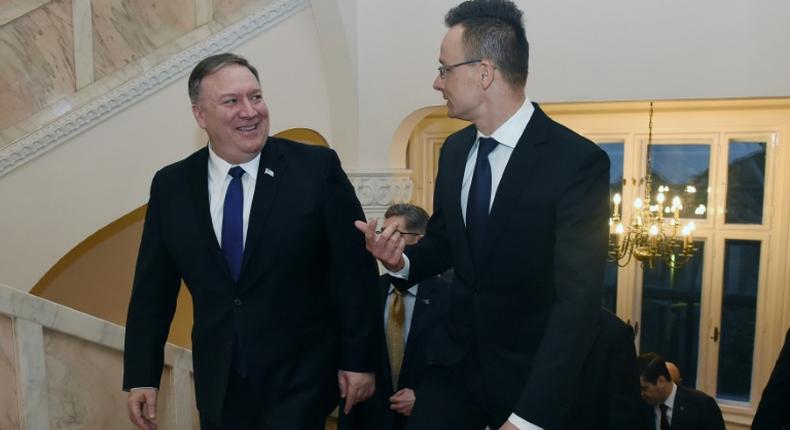 US Secretary of State Mike Pompeo (left) is welcomed in Budapest by Hungary's Foreign Minister Peter Szijjarto