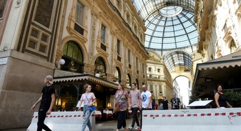 Concrete barriers have been placed at the entrance of the Vittorio Emanuel II gallery near the Duomo in Milan after the attacks in Spain