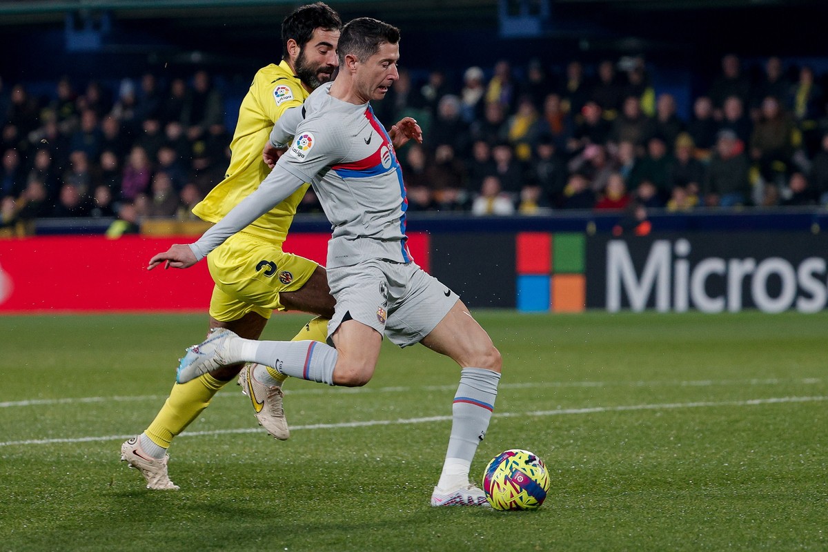 Robert Lewandowski i Raul Albiol