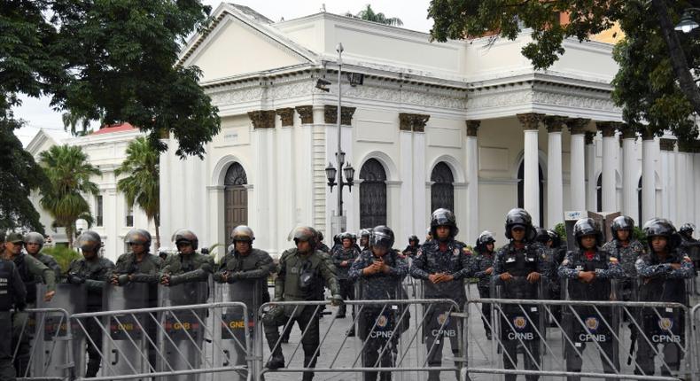 Security forces in January 2020 stand outside Venezuela's National Assembly, the only institution in the country led by the opposition but which has been rendered powerless