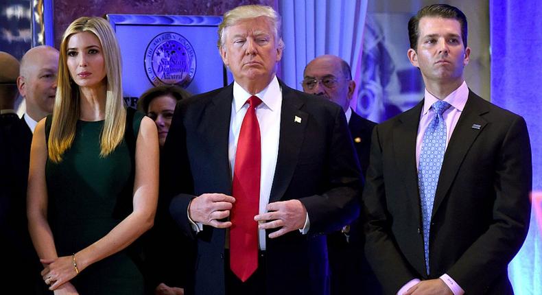 Donald Trump stands with his children Ivanka and Donald Jr., during Trump's press conference at Trump Tower in New York on January 11, 2017.TIMOTHY A. CLARY/AFP via Getty Images
