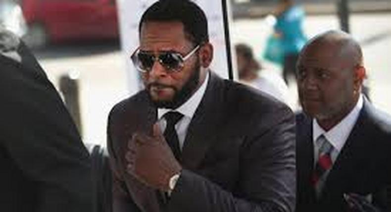 R. Kelly arrested on child pornography and other federal charges