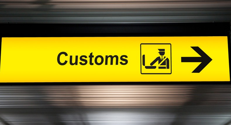 An airport customs sign.Customs sign at an international airport.