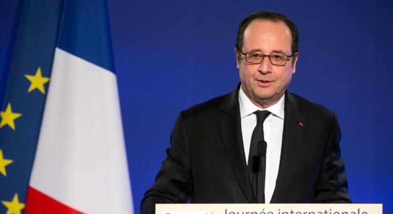 French President Francois Hollande delivers a speech during a meeting as part of the 40th International Women's Day on March 8, 2017, at the French Foreign Affairs Ministry in Paris