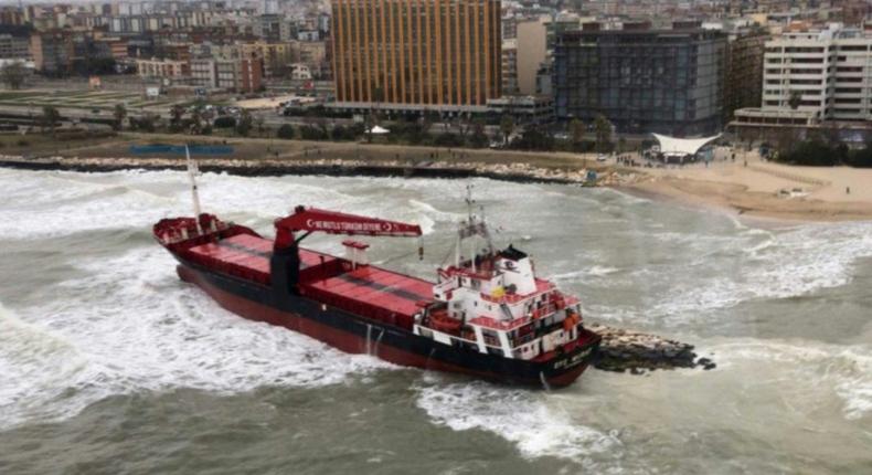 This aerial framegrab from the Italian Coast Guards shows a Turkish-flagged cargo ship after it ran ashore on a beach in Bari due to bad weather conditions