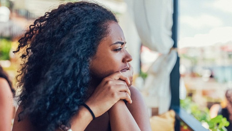 Black woman thinking (Zora)