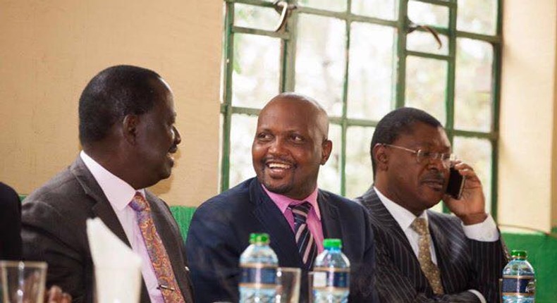 Gatundu South MP Moses Kuria with Opposition leader Raila Odinga 