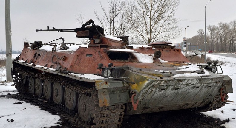 A destroyed Russian military vehicle is seen on the roadside on the outskirts of Kharkiv on February 26, 2022.