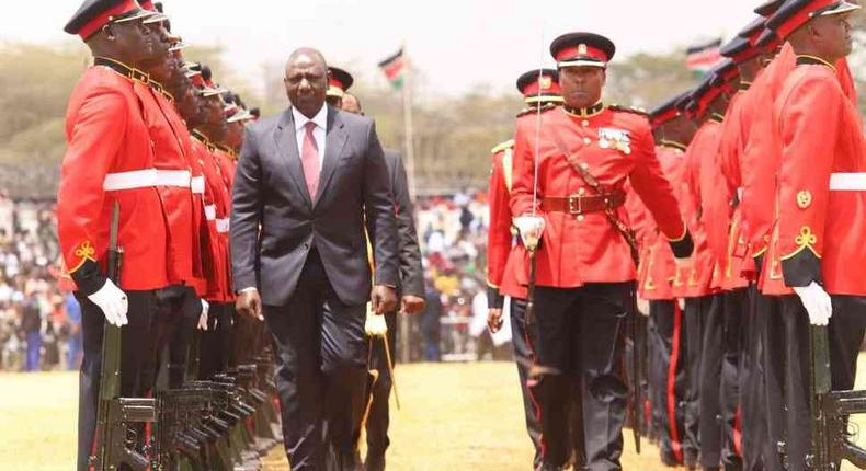 President William Ruto inspecting a guard of honour during the Mashujaa Day celebrations at Uhuru Gardens