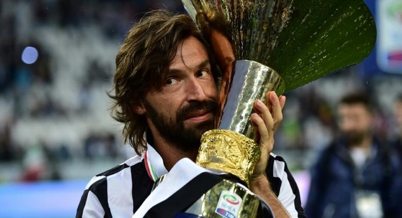 Juventus' midfielder Andrea Pirlo pictured in 2015 with the Italian League's trophy