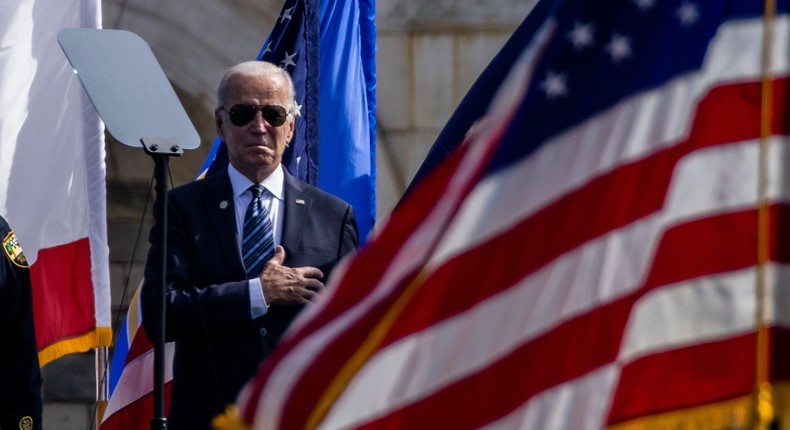 President Joe Biden stands during the US National Anthem at the 40th Annual National Peace Officers Memorial Service on the West Front of the US Capitol Building on October 16, 2021 in Washington, DC.
