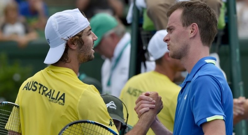 Jordan Thompson of Australia shakes hands with Jan Satral of the Czech Republic after winning his Davis Cup World Group match, at Kooyong in Melbourne, on February 5, 2017