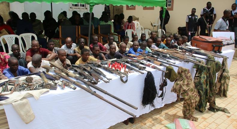 Criminal suspects paraded with arms and ammunition by the Nigeria Police Force in 2019 [NPF]