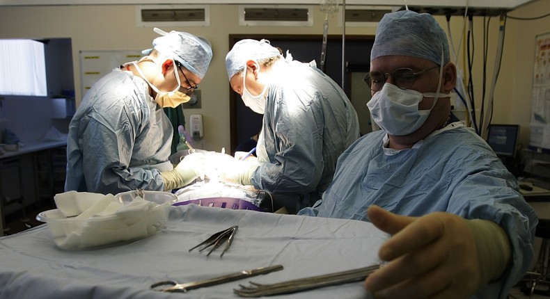 Consultant Surgeon Andrew Ready and his team conducts a live donor kidney transplant at The Queen Elizabeth Hospital Birmingham on June 9, 2006, in Birmingham, England. Kidney failure patient Carol Playfair was given the chance of life when her sister Tracey Playfair offered one of her own perfect kidneys to help save the life of Carol.Christopher Furlong/Getty Images