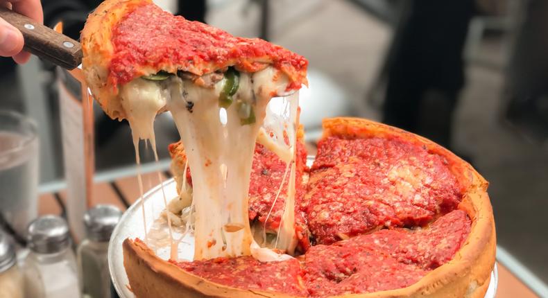 Cheese lovers should be required to try Chicago deep-dish pizza.Supitcha McAdam/Shutterstock