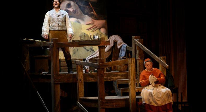 Italian tenor Riccardo Massi, left, performs as Cavaradossi on stage with bass Wei Wu as the sacristan in Washington National Opera's (WNO) production of 'Tosca' at the Kennedy Center in Washington on May 22, 2019