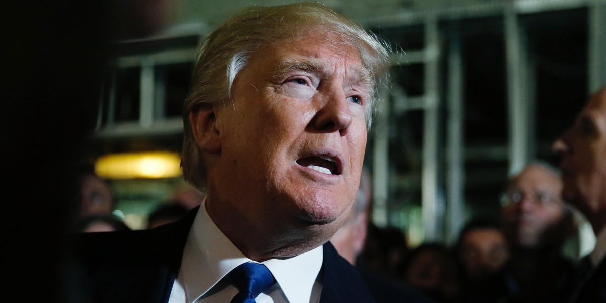 Republican US presidential candidate Donald Trump speaks to reporters as he leads the news media on a tour of the construction site of Trump International Hotel at the Old Post Office Building in Washington, DC, on March 21.