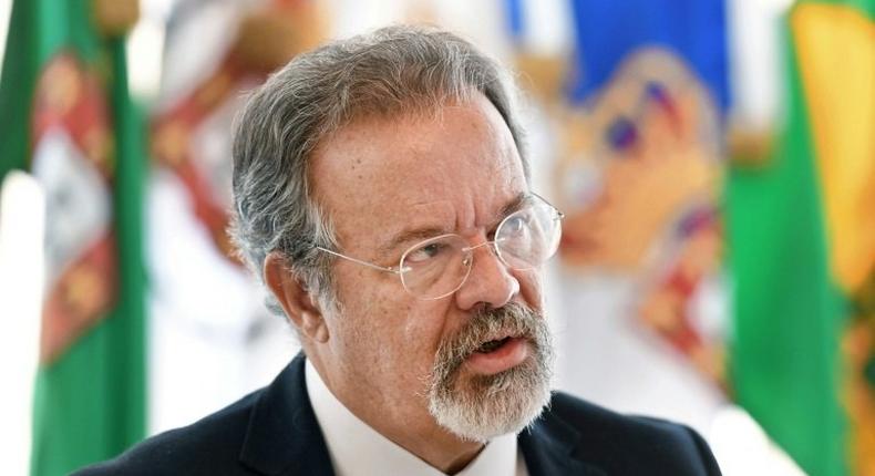 Brazilian Defence Minister Raul Jungmann talks with foreign correspondents during a breakfast meeting at the Ministry in Brasilia, on May 17, 2017