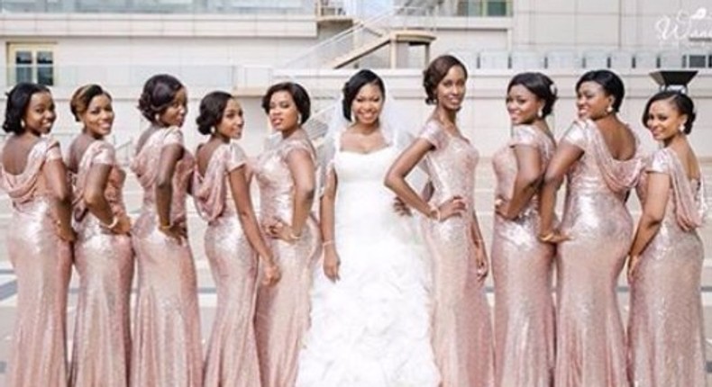 Tinuke Ogundero and her bridesmaids on her white wedding day