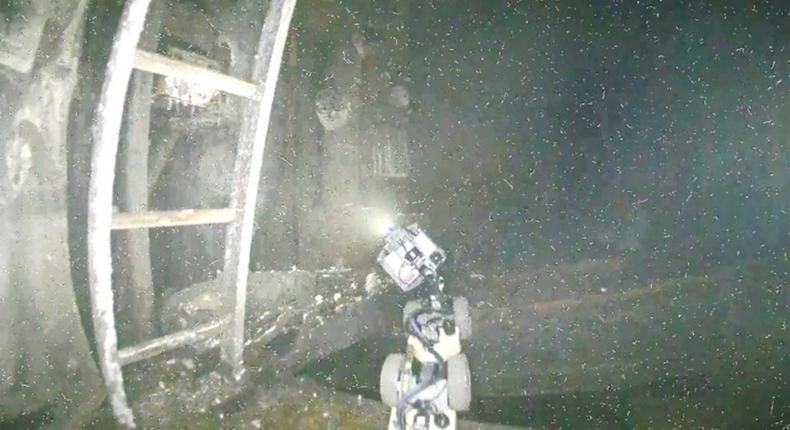 A still from video footage shows the inside of the Fukushima Daiichi power station that melted down in 2011.TEPCO via AP