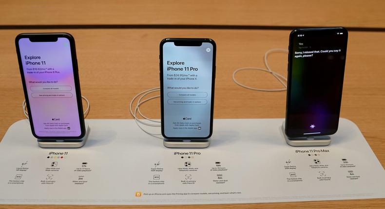 FILE PHOTO: Apple iPhone 11's are pictured inside of the Apple Store on Fifth Ave in the Manhattan borough of New York, New York, U.S., September 20, 2019. REUTERS/Carlo Allegri