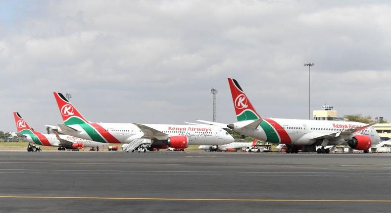 A picture taken on August 1, 2020 shows Kenya Airways planes parked at the parking bay at the Jomo Kenyatta international airport in Nairobi. (Photo by SIMON MAINA/AFP via Getty Images)