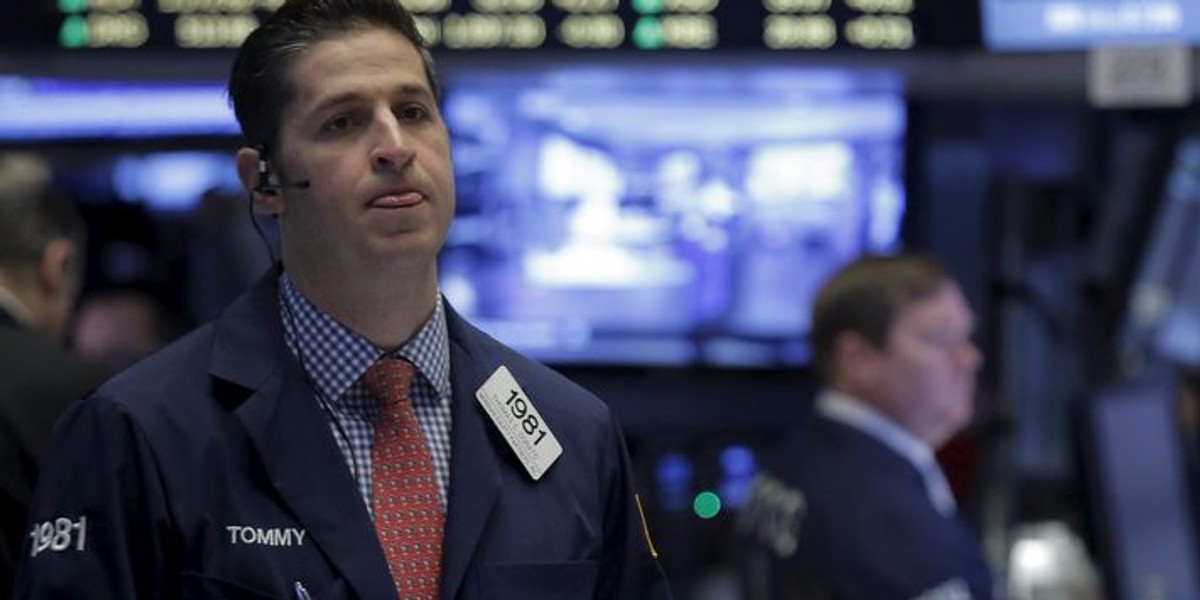 Traders work on the floor of the New York Stock Exchange