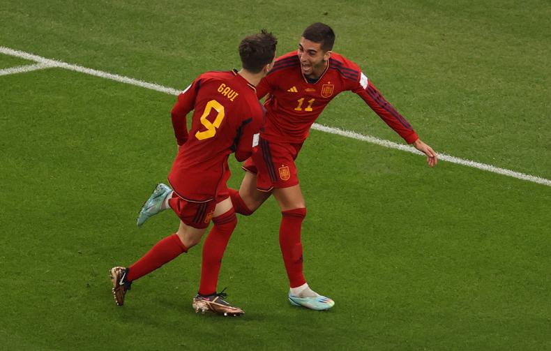 Gavi and Ferran Torres celebrate Torres' goal against Costa Rica
